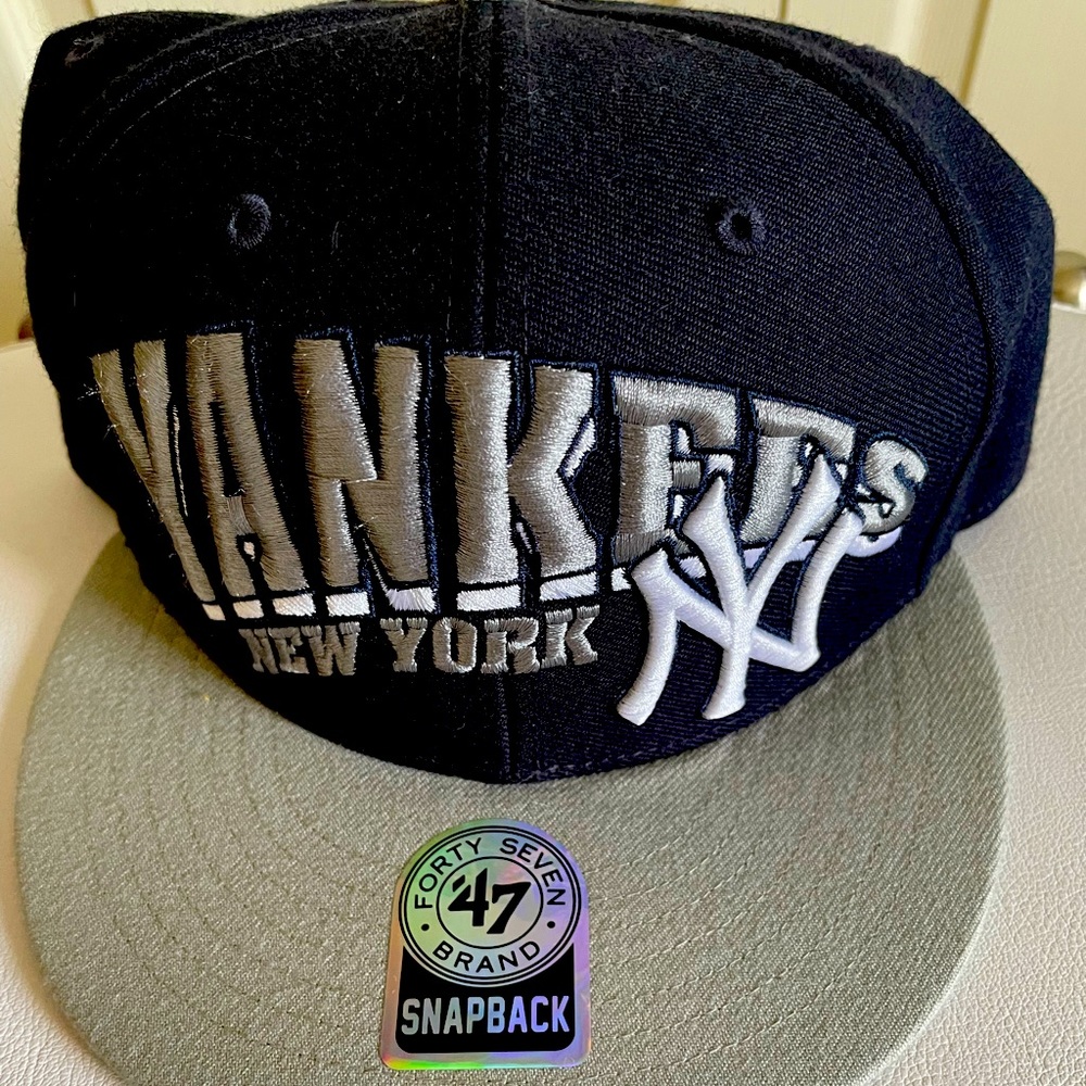 NY Yankees hat.
